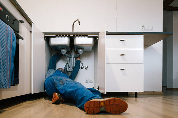 Professional Emergency Plumber technician working in Marshall, IN